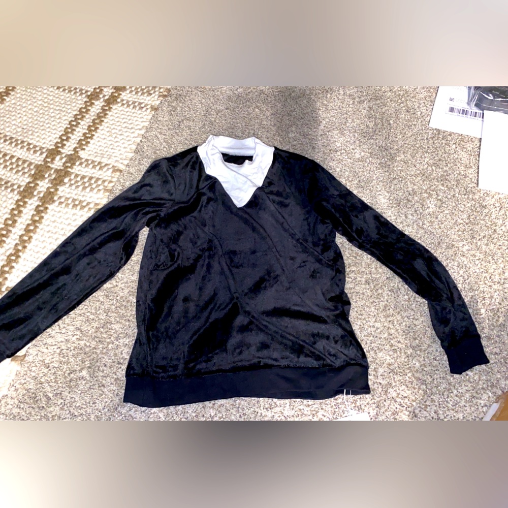 Girls size 12 sweater with white around neck